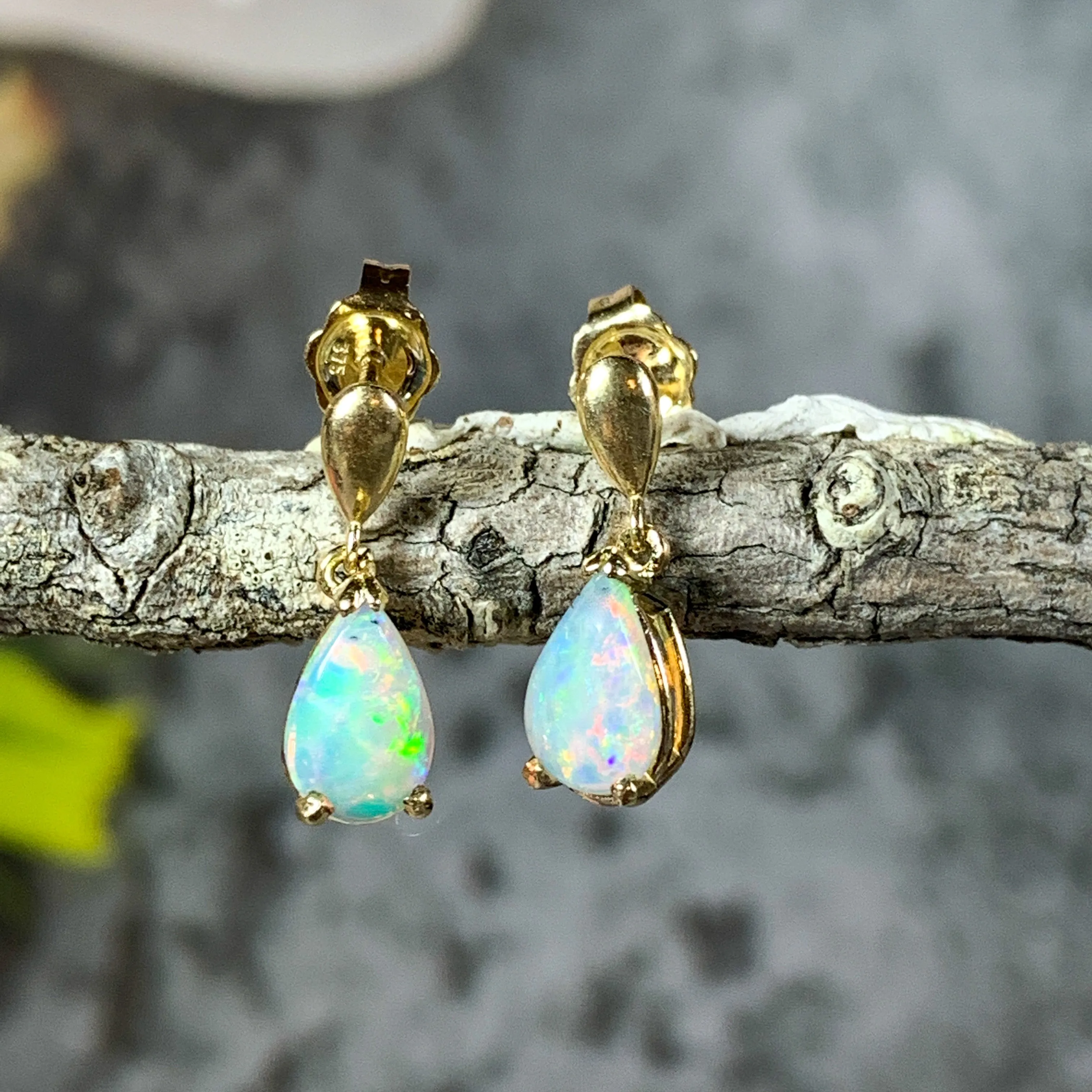 14kt Yellow Gold dangling pear shape 8x5mm Crystal Opal earrings