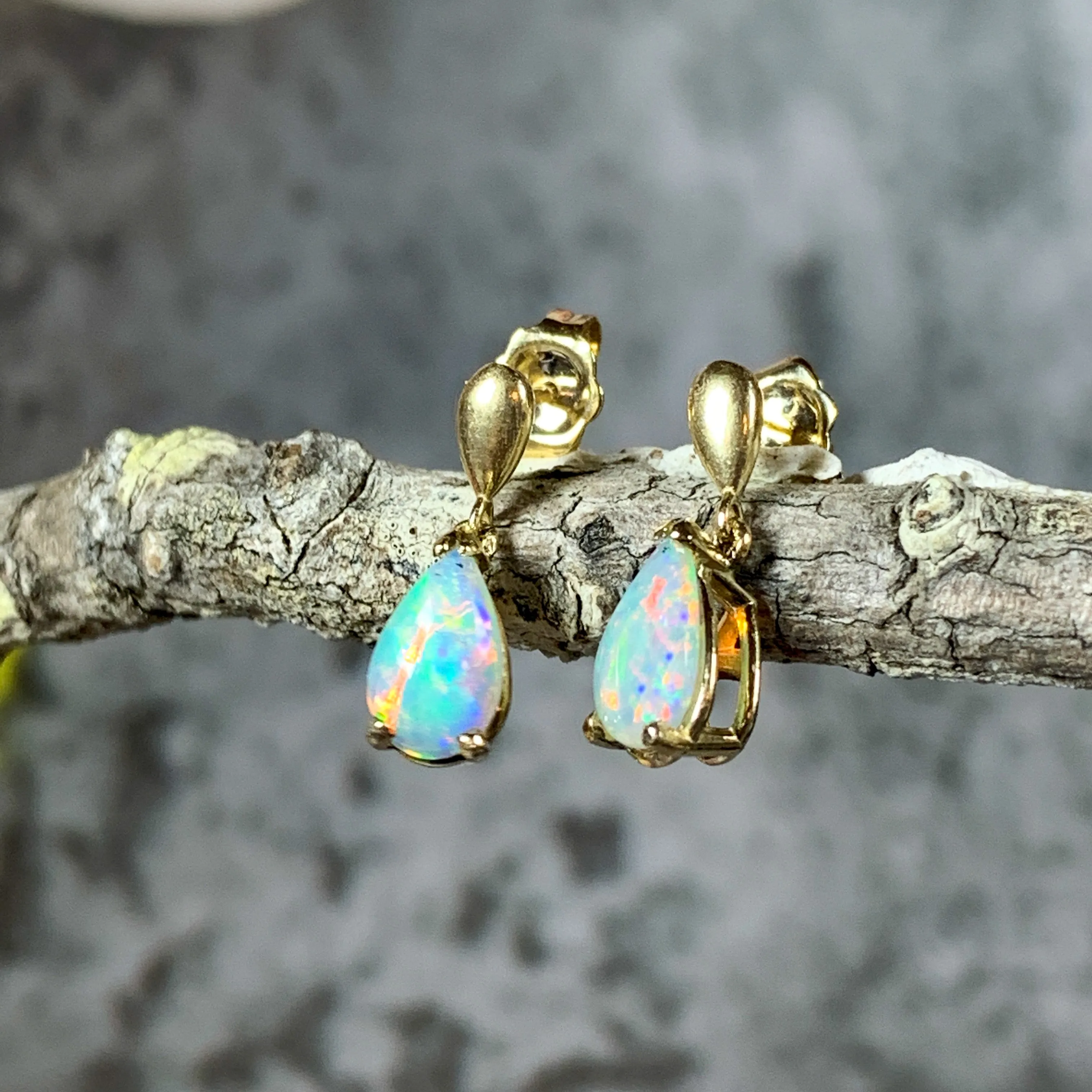 14kt Yellow Gold dangling pear shape 8x5mm Crystal Opal earrings