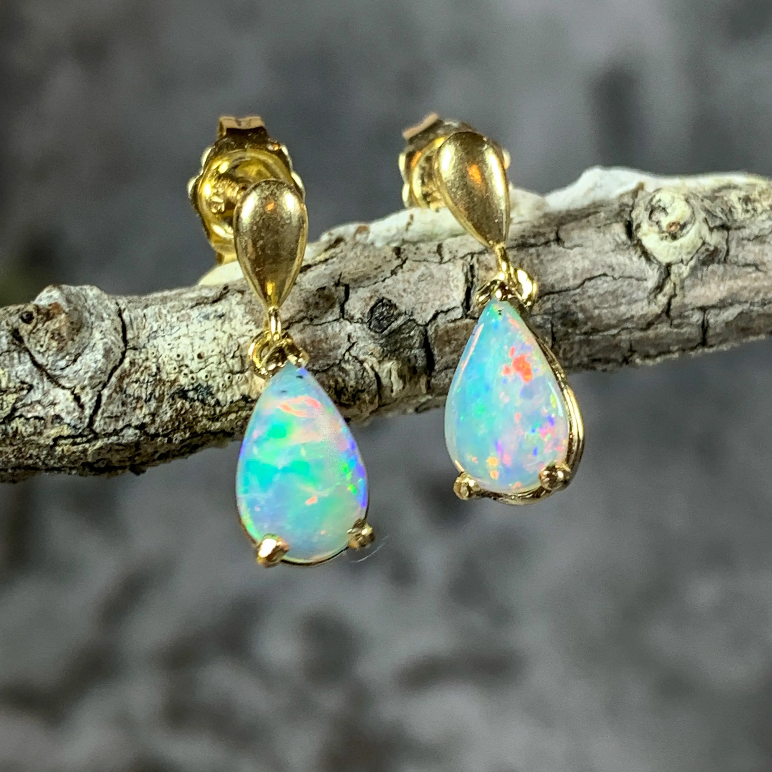 14kt Yellow Gold dangling pear shape 8x5mm Crystal Opal earrings