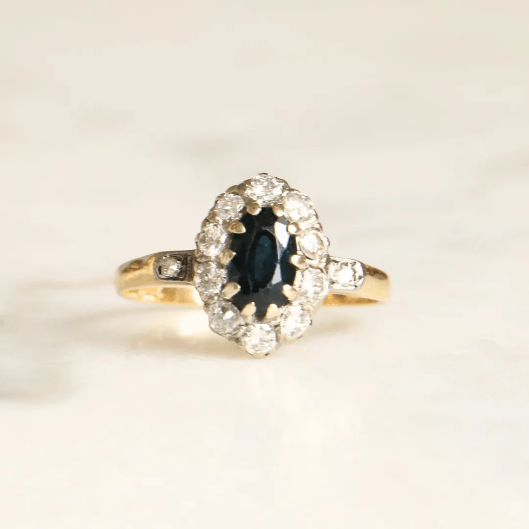 18ct Gold Oval Cut Sapphire and Diamond Halo Ring