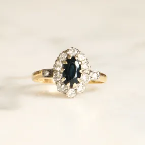 18ct Gold Oval Cut Sapphire and Diamond Halo Ring