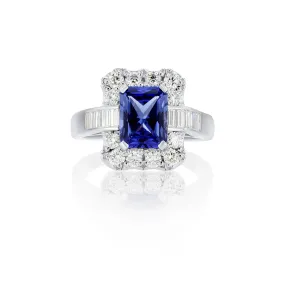 2.74 CT Emerald Cut Lab Grown Blue Sapphire and 2.00 Cttw Mixed Cut Diamond Halo Platinum Engagement Ring