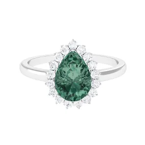 Created Green Sapphire and Moissanite Halo Teardrop Ring